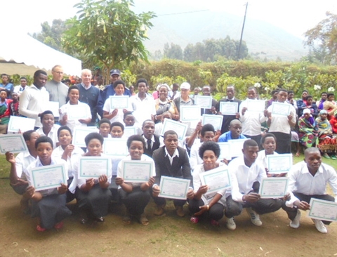 Youth with their certificates after finishing the training in culinary art at a centre managed by Solidarjob